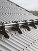 Кронштейн универсальный Grand Line для фальцевой кровли RR 32 - в «Монолит-Металлопрокат».